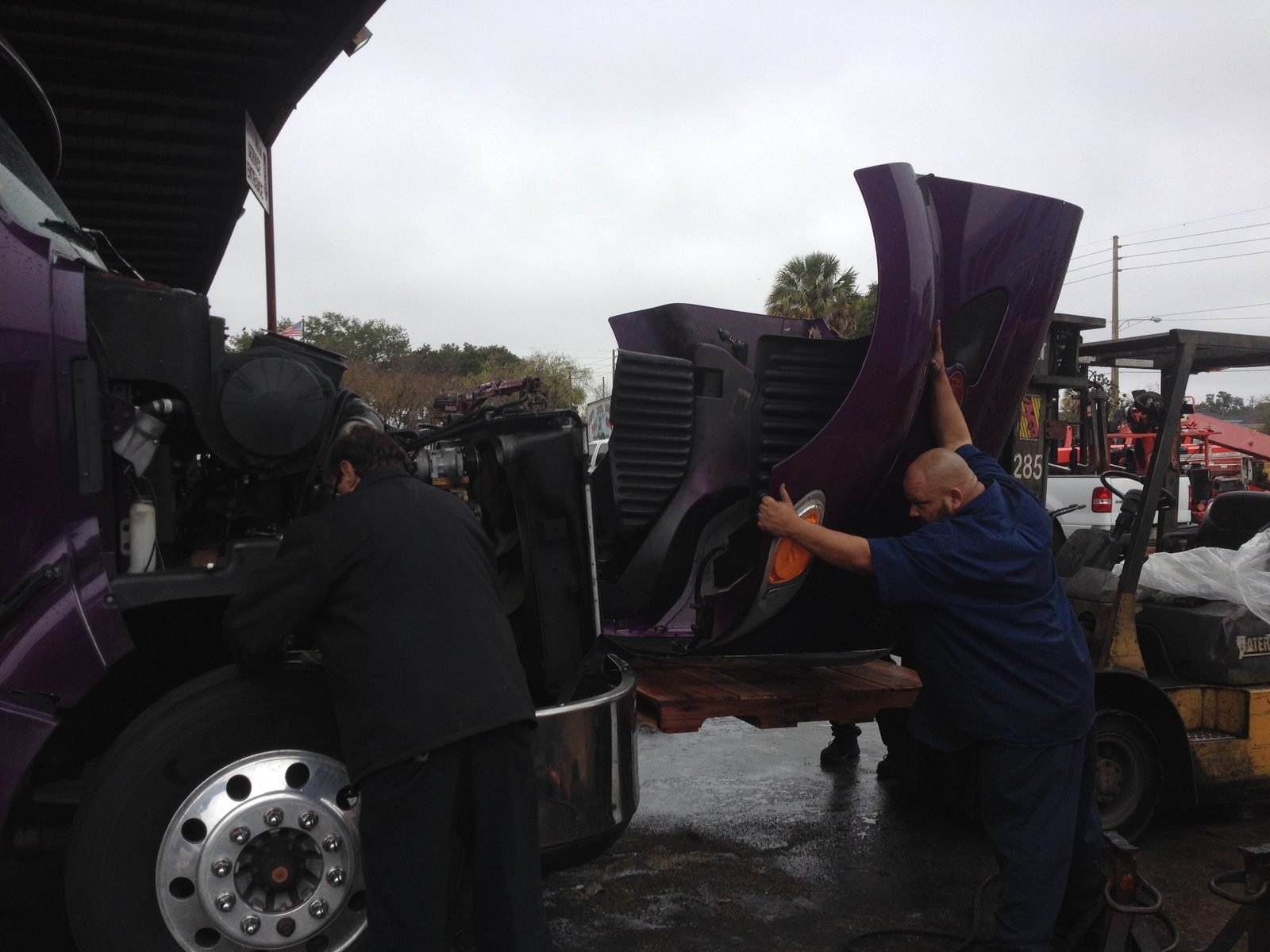 Reinstalling the hood before the test drive